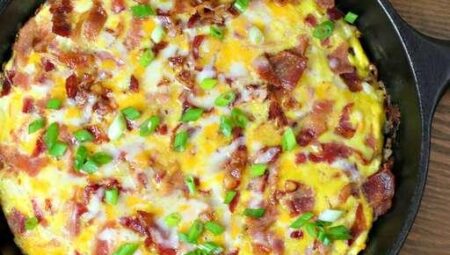 Cheesy Bacon, Sausage, and Egg Hash Brown Skillet